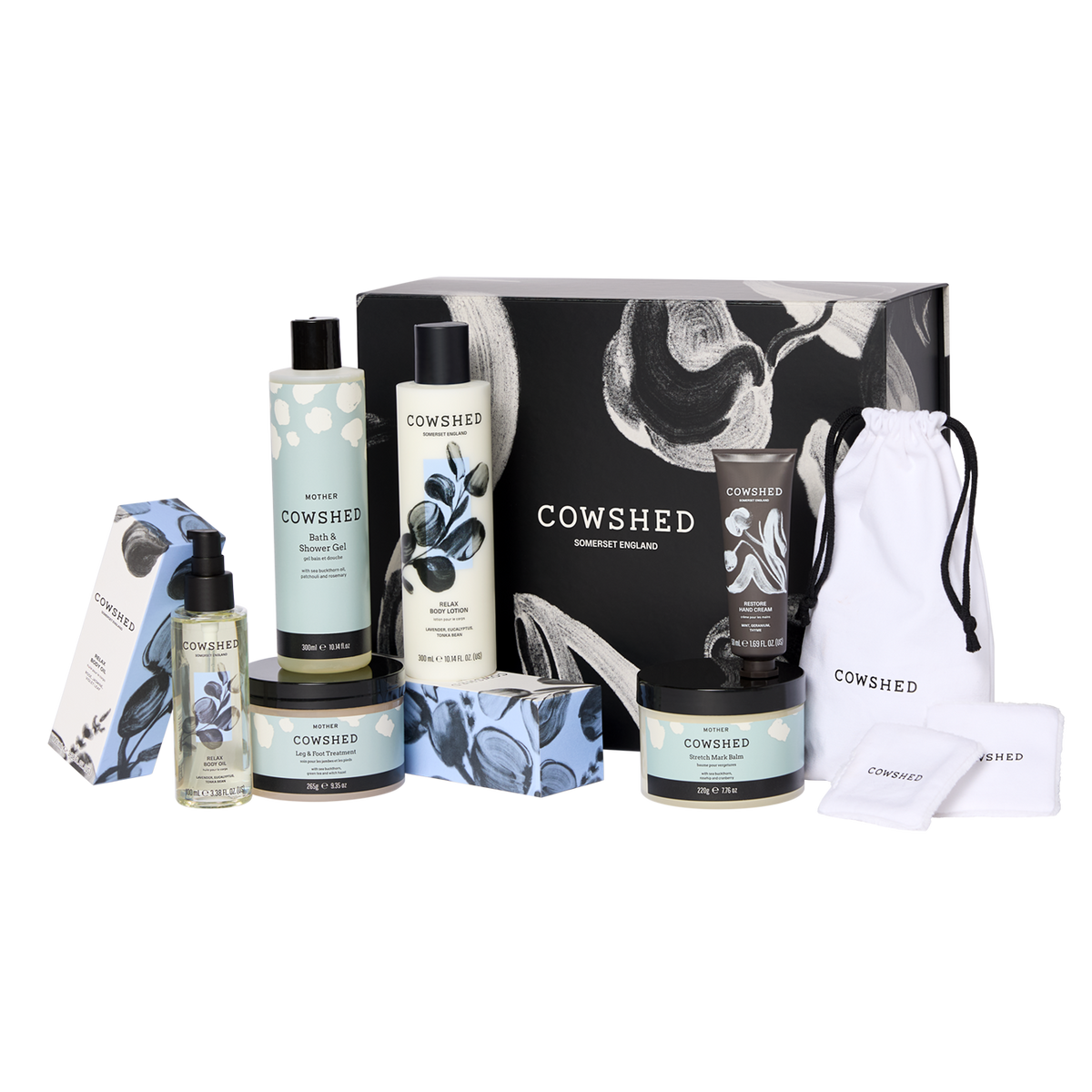 Cowshed skincare products including bottles, jars, and a pouch on a white background