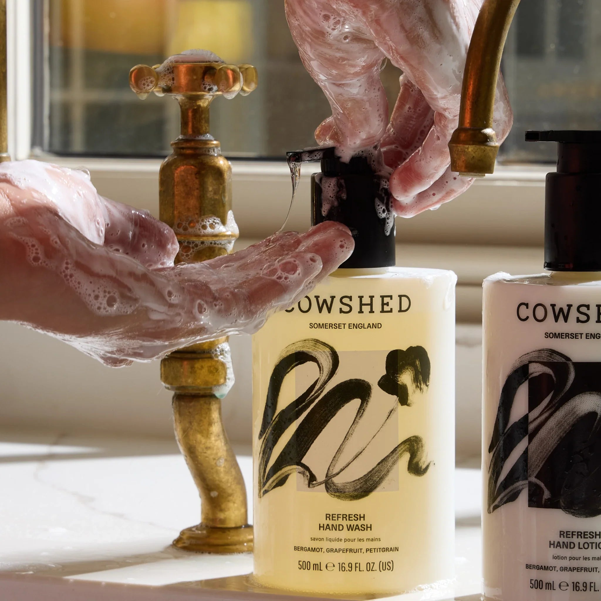 Refresh hand wash being pumped out of a 500ml bottle into a hand