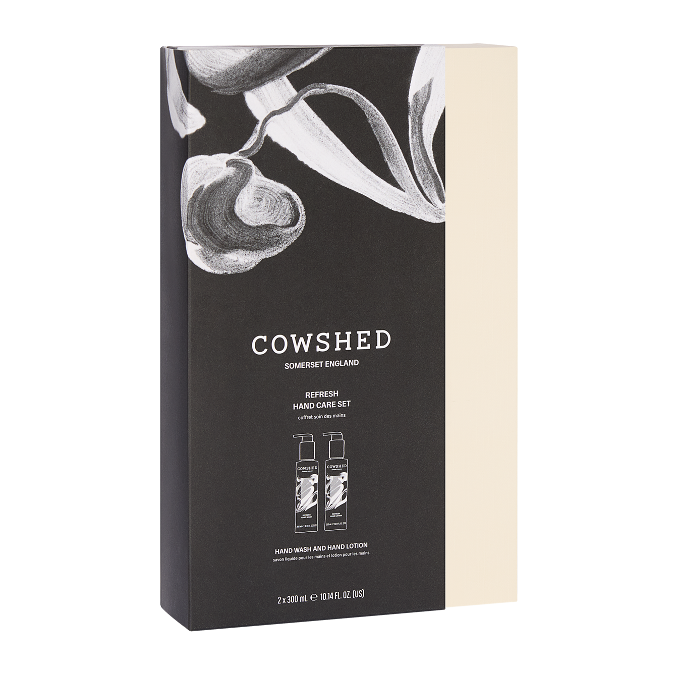 Cowshed hand care set packaging with black and white floral design
